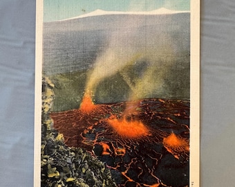 May include: Vintage postcard featuring a vibrant depiction of Halemaumau, Hawaii National Park. The image showcases a volcanic landscape with flowing lava in shades of red and orange, with smoke rising against a blue sky. The text "HALEMAUMAU, HAWAII NATIONAL PARK" is printed at the top.