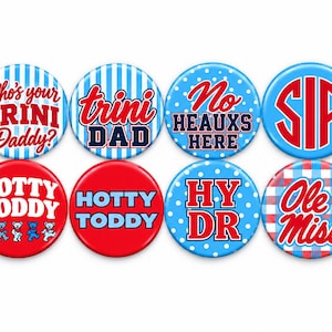 May include: A set of eight circular pin-back buttons featuring red, white, and blue designs. Text includes Who's your TRINI Daddy?, trini DAD, No HEAUX S HERE, SIP, HOTTY TODDY, HY DR, and Ole Miss, with various patterns like stripes, dots, and plaid.