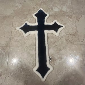 Blue and white cross tufted rug