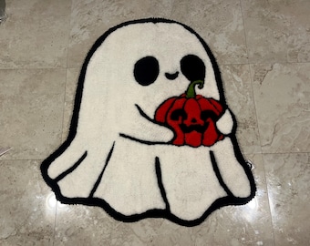Ghost carrying pumpkin tufted rug