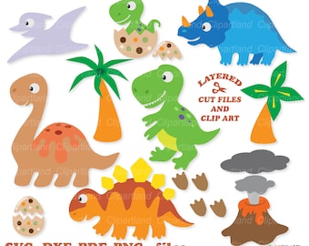 May include: A set of layered cut files and clip art featuring dinosaurs, palm trees, and a volcano. The dinosaurs are in various colors, including green, blue, orange, and brown. The set includes a stegosaurus, a triceratops, a brachiosaurus, a tyrannosaurus rex, and a pterodactyl. The palm trees are green with brown trunks. The volcano is orange with a gray plume of smoke. The text "LAYERED CUT FILES AND CLIP ART" is written in red and white.