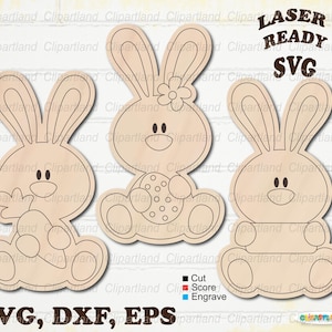 May include: Three wooden bunny cutouts with different designs. One bunny holds a carrot, another holds an egg, and the third is plain. The image includes the text "LASER READY SVG" and file type options: SVG, DXF, EPS.