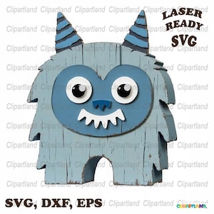 Op de afbeelding: Een blauw en wit monster met een brede grijns, ontworpen voor lasersnijden. Het monster heeft grote ogen en een houtnerfstructuur. De tekst "LASER READY SVG" staat in de rechterbovenhoek van de afbeelding. De tekst "SVG, DXF, EPS" staat in de linkerbenedenhoek van de afbeelding.
