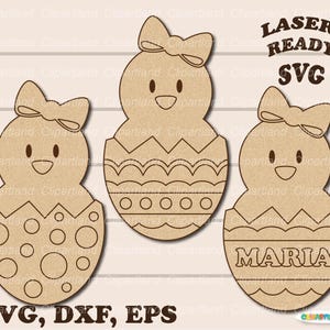 May include: Three laser-cut wooden chick shapes with bows. The chicks are holding eggs with different patterns. One egg has a polka dot pattern, one has a wavy line pattern, and one has a solid pattern with the word "MARIA" written on it. The text "LASER READY SVG" is at the top of the image. The text "SVG, DXF, EPS" is at the bottom of the image.