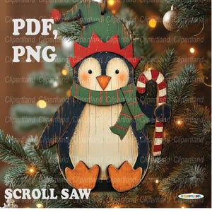 May include: Wooden penguin Christmas ornament with a green and red scarf, hat, and candy cane. The penguin has orange feet and a white belly. Text on the ornament reads "PDF, PNG, SCROLL SAW".