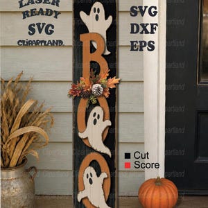 May include: A vertical wooden sign featuring the word BOO in orange letters with white ghost illustrations integrated into the design. The sign includes a decorative cluster of autumn leaves and a pinecone. Text reads LASER READY SVG DXF EPS.