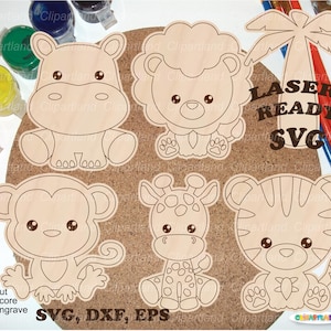 May include: Wooden laser-cut animal shapes including a hippo, lion, monkey, giraffe, and tiger. A palm tree shape and the text "LASER READY SVG" are also included. The shapes are on a corkboard surface.