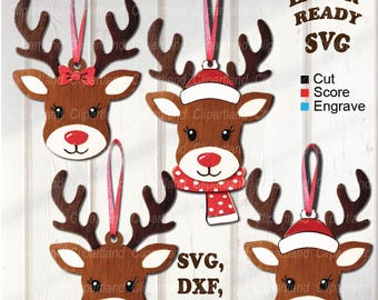 May include: Wooden reindeer ornaments with red noses, antlers, and pink hanging ribbons. Some reindeer have a red bow, scarf, or Santa hat. The image includes the text "LASER READY SVG" and file type options.