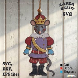 May include: A mouse figure in regal attire, featuring a crown and a colour palette of red, purple, and gold. The figure hangs by a string and has the text "LASER READY SVG" and "SVG, DXF, EPS files".