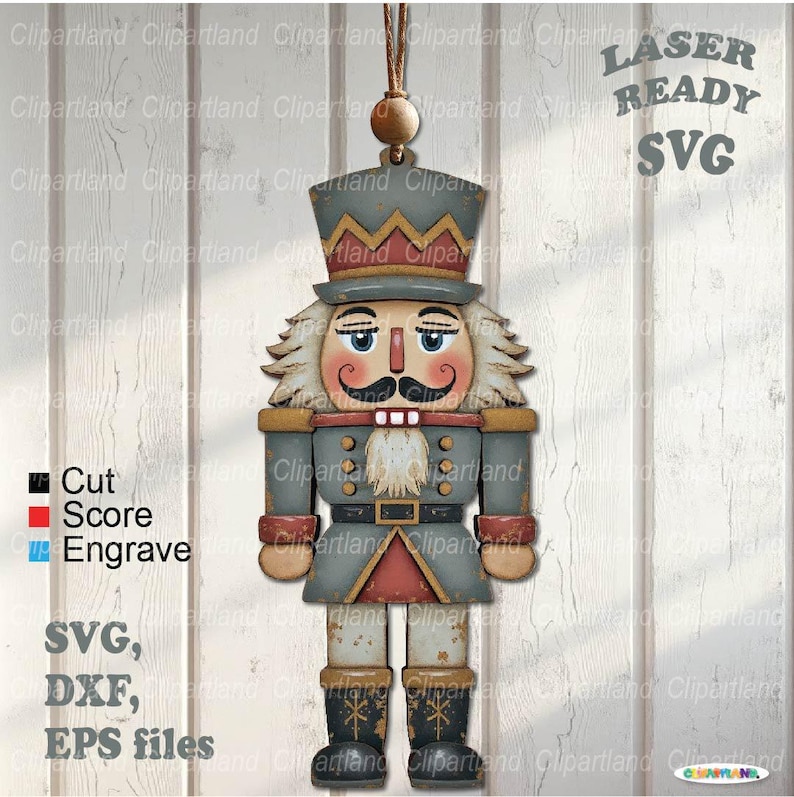 May include: A wooden nutcracker ornament with a gray and red uniform, a black mustache, and a tall hat. The ornament is hanging from a string and has the text "LASER READY SVG". The image also includes the text "SVG, DXF, EPS files".