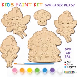 Puede incluir: Un kit de manualidades en madera etiquetado KIDS PAINT KIT SVG LASER READY con tres figuras de hadas, un hongo y una casa. Incluye un pincel y siete botes de pintura pequeños. El texto incluye SVG, DXF, EPS y una leyenda para Cut, Score, Engrave.