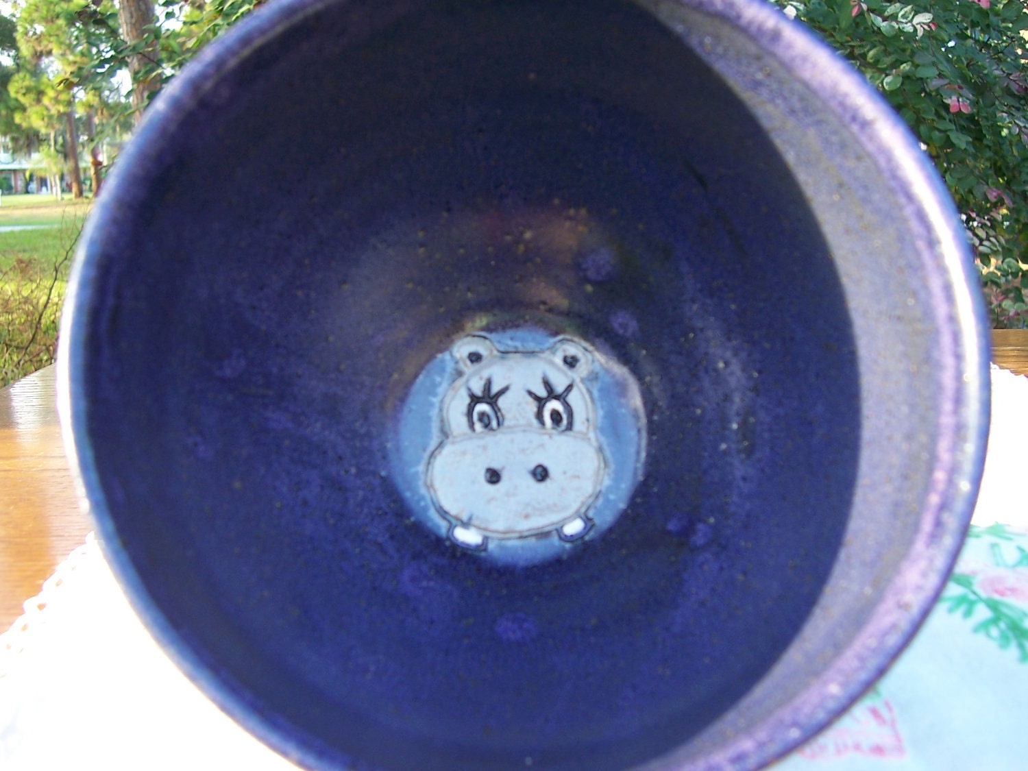 Bowl with cartoon animal on bottom