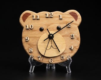 Reloj con cabeza de oso de peluche