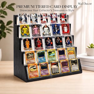 May include: A black, five-tiered wooden display stand featuring multiple rows of clear protective cases holding various sports and trading cards. The top of the display includes the text "PREMIUM TIERED CARD DISPLAY" and "Sial Decor".