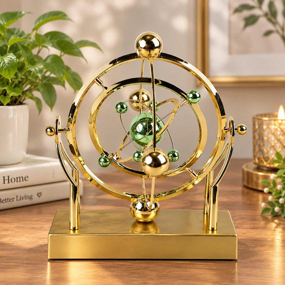 A handcrafted orbiting celestial mobile that actually moves, turning any desk into a miniature solar-system hypnosis machine.