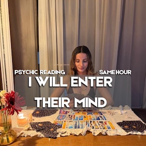 May include: A psychic reading service featuring the text PSYCHIC READING SAME HOUR I WILL ENTER THEIR MIND displayed over a spread of tarot cards on a white cloth, with a lit candle and a vase of red and white flowers nearby.