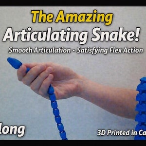 May include: A blue articulating snake toy with a segmented body design. The text on the image reads: The Amazing Articulating Snake! Smooth Articulation • Satisfying Flex Action, 5ft long, and 3D Printed in Canada. The snake is flexible.