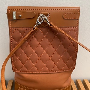 Sac à dos en cuir cousu main