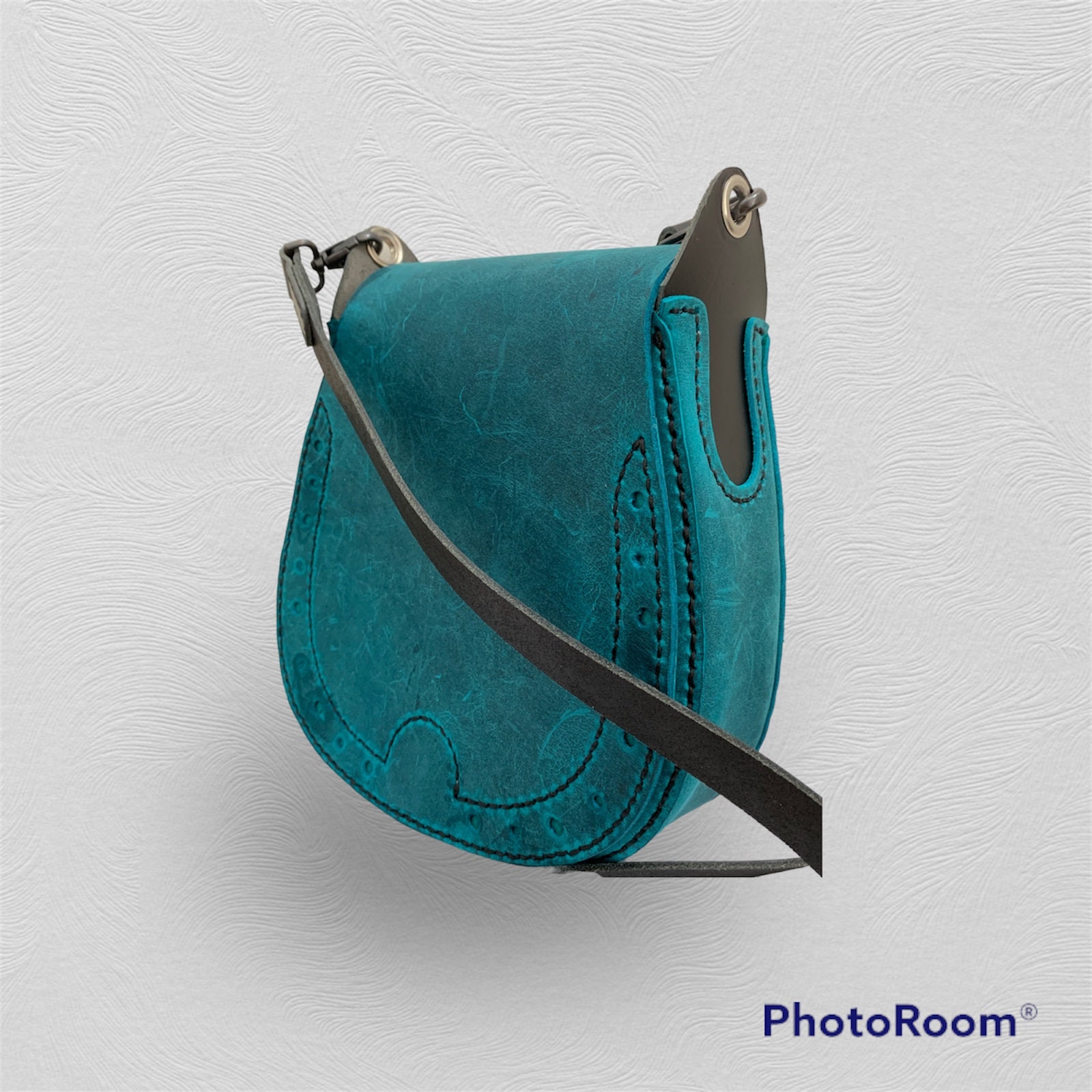 Hand sewn turquoise and black leather handbag