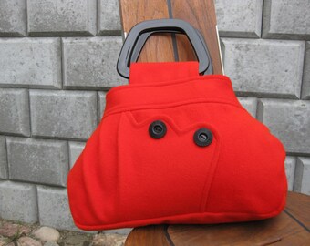 Handbag sewn from soft and lovely merino felt