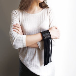 Luxurious fringe bracelet made of natural patent leather, Black leather bracelet