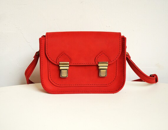 red leather messenger bag