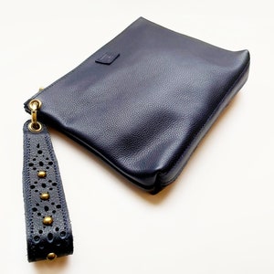 Navy clutch bag with wrist strap discount