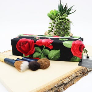 May include: A set of three ceramic nesting bowls in graduating sizes. The bowls are white with a speckled, textured finish. The largest bowl is approximately 8 inches in diameter, the medium bowl is 6 inches, and the smallest is 4 inches.