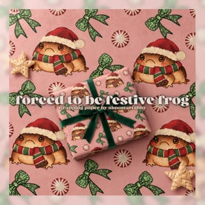 May include: Wrapping paper featuring a repeating pattern of a brown frog wearing a red Santa hat and a red and green striped scarf on a pink background with green glittery bows, peppermint candies, and stars, with text forced to be festive frog.