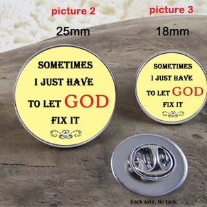May include: A yellow and silver pinback button with the text "Sometimes I just have to let God fix it". The button is 25 mm in diameter. The back of the button is silver and has a tie tack.