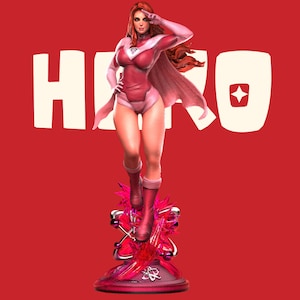 May include: A figurine of a superhero with long red hair, wearing a pink and red bodysuit with a cape, saluting. The figure stands on a base featuring a stylized atom symbol and crystalline structures. The background is red with the text HERO.