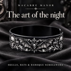 May include: A black cuff bracelet featuring a detailed white graphic print of a central bat with spread wings, flanked by skulls and intricate scrollwork. The text MACABRE MANOR, The art of the night, and SKULLS, BATS & BAROQUE SCROLLWORK appear.