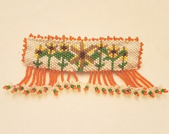 These are hand beaded barrettes , some have a barrette & earring