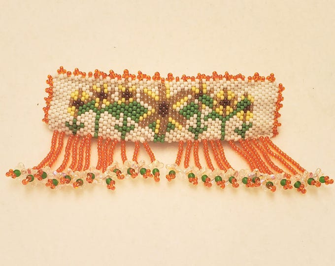 These are hand beaded barrettes , some have a barrette & earring