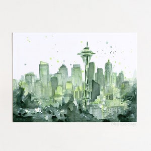 May include: Watercolor painting of the Seattle skyline with the Space Needle in the center. The buildings are painted in shades of green and gray, with a white background.