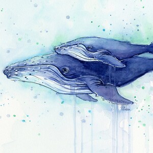 May include: Watercolor painting of two humpback whales swimming together in a blue and green ocean. The whales are painted in shades of blue and purple, with white highlights on their bodies. The background is a light blue with green and blue watercolor splatters.