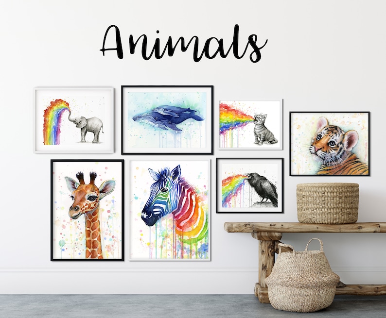 May include: A set of eight watercolor paintings featuring various animals, each with a rainbow emanating from their mouths. The animals include a giraffe, zebra, elephant, whale, cat, crow, and tiger. The word "Animals" is written in black cursive at the top of the image.