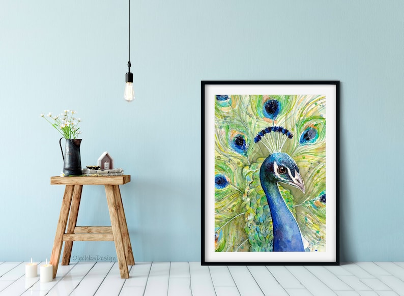 May include: A watercolor painting of a peacock with its feathers spread out. The peacock's head is turned to the side, and its eye is visible. The feathers are a mix of green, blue, and yellow.