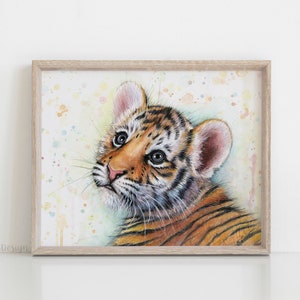 May include: A watercolor painting of a cute tiger cub with orange and black stripes. The cub is looking up with its mouth slightly open. The background is a light yellow with watercolor splatters.
