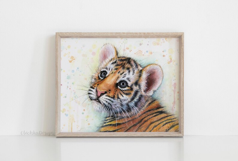 May include: A watercolor painting of a cute tiger cub with orange and black stripes. The cub is looking up with its mouth slightly open. The background is a light yellow with watercolor splatters.