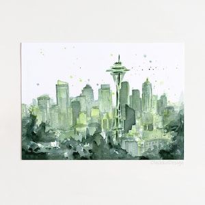 May include: A watercolor painting of the Seattle skyline with the Space Needle in the center. The buildings are painted in shades of green and gray, with a white background.