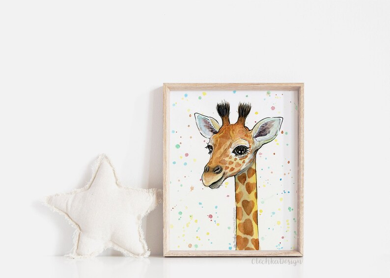 May include: A watercolor painting of a giraffe with a light brown and orange spotted pattern. The giraffe has a light blue background with colorful dots. The painting is framed in a light wood frame.