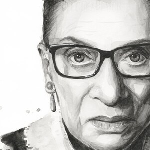 May include: Black and white watercolor portrait of Ruth Bader Ginsburg, a prominent Supreme Court Justice, wearing glasses and a collared shirt. The portrait is painted in a realistic style and captures her serious expression.