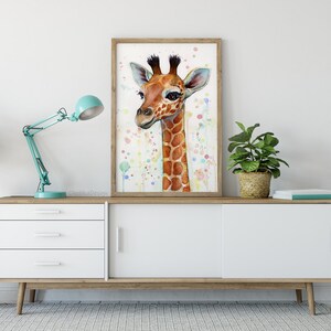 May include: A watercolor painting of a giraffe's head with a light brown and orange spotted pattern. The background is a light blue with white and pink dots.