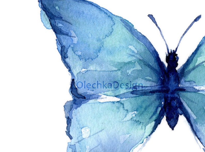 May include: A watercolor painting of a blue butterfly with its wings spread out. The butterfly is painted in shades of blue and green, with a darker blue body.