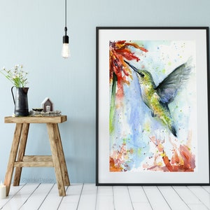 May include: Watercolor painting of a hummingbird in flight, with its beak extended towards a red flower. The background is a soft blue with splashes of green and orange.