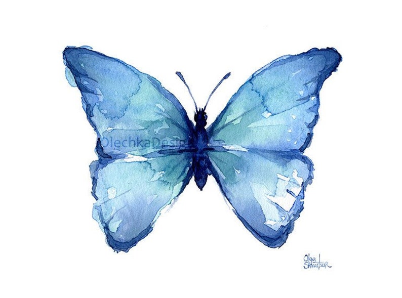 May include: A watercolor painting of a blue butterfly with its wings spread open. The butterfly is painted in shades of blue and green, with a hint of white in the center of the wings.