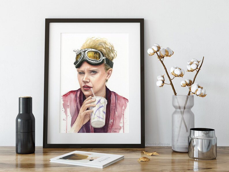 May include: Watercolor painting of a woman wearing aviator goggles and a pink shirt, drinking from a paper cup with a straw.