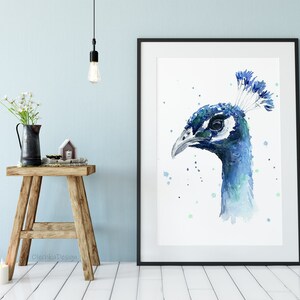 May include: Watercolor painting of a peacock's head in shades of blue and green, with a white background and green watercolor splatters.