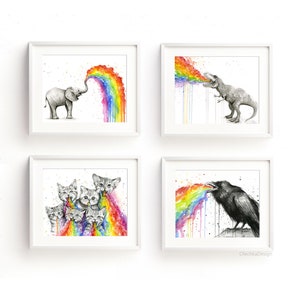 May include: Four framed watercolor paintings of animals blowing rainbows. The animals are an elephant, a dinosaur, a group of kittens, and a raven. The paintings are all in black and white except for the rainbows, which are in a variety of colors.
